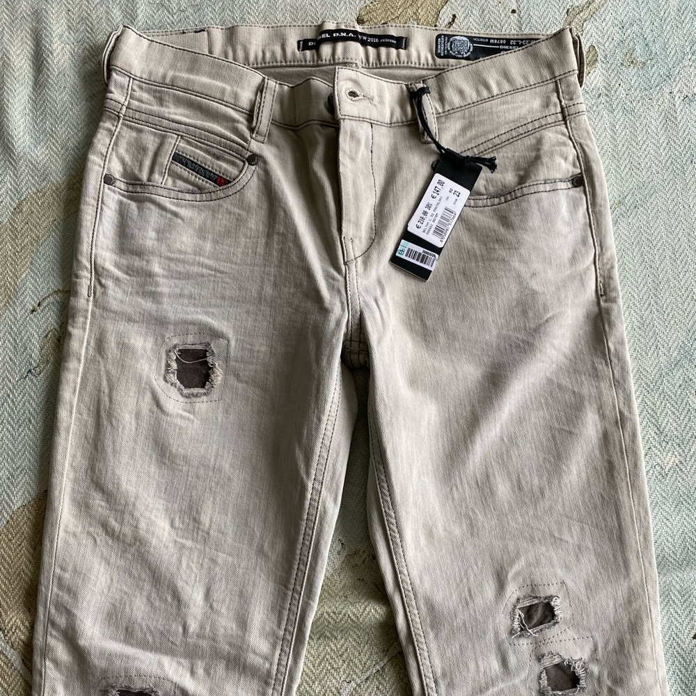 Brand new DIESEL GREY SKINNY DISTRESSED JEANS SIZE 23/32 stretchy